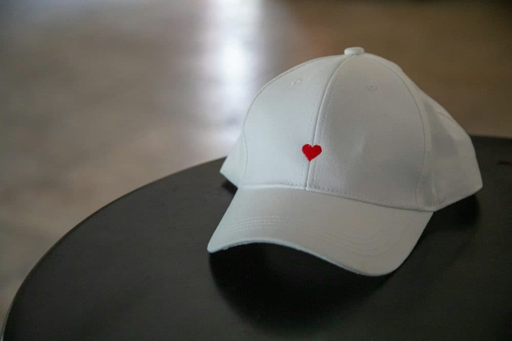 White baseball cap on a round table
