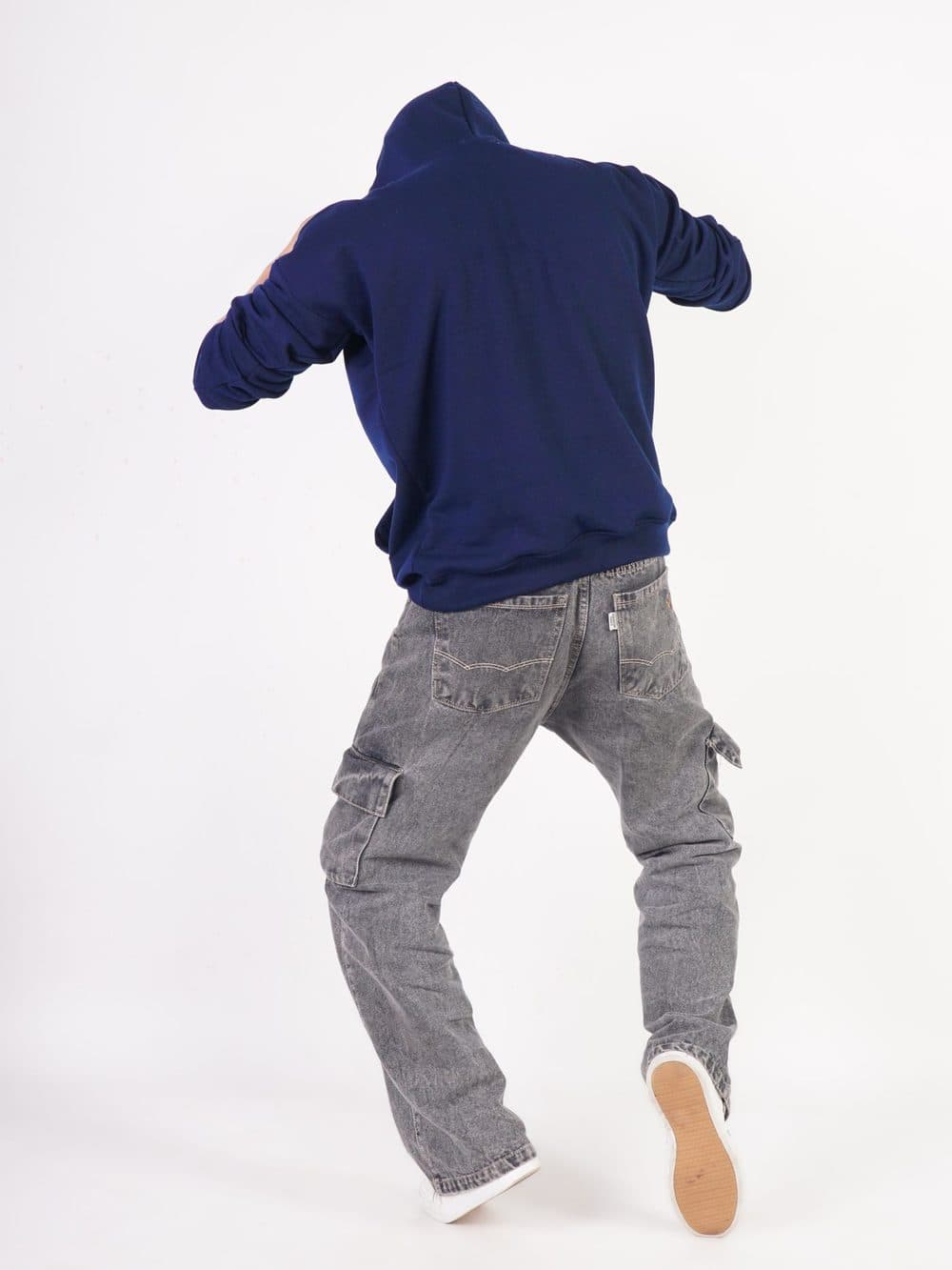 Navy blue hoodie seen from behind on a white background