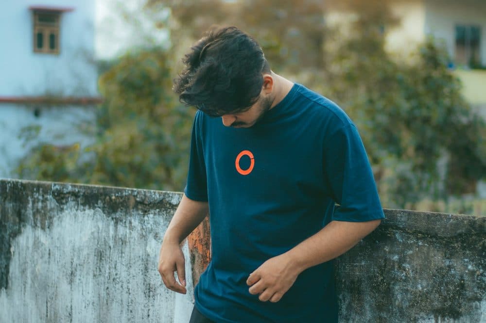 Blue t-shirt with a small chest graphic